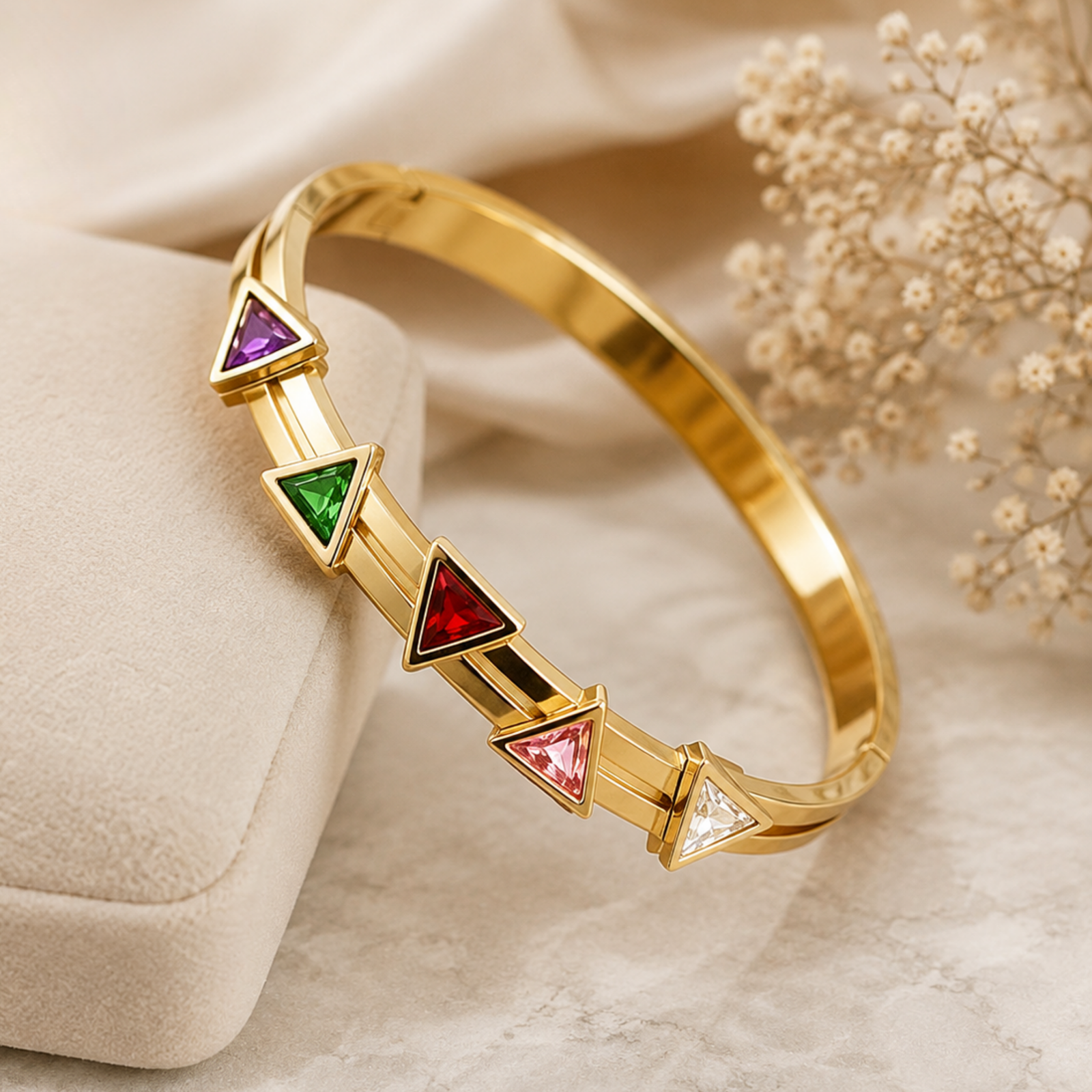 Multicolour Bangle ANVOR multicolour bangle with five triangular purple, green, red, pink and clear details