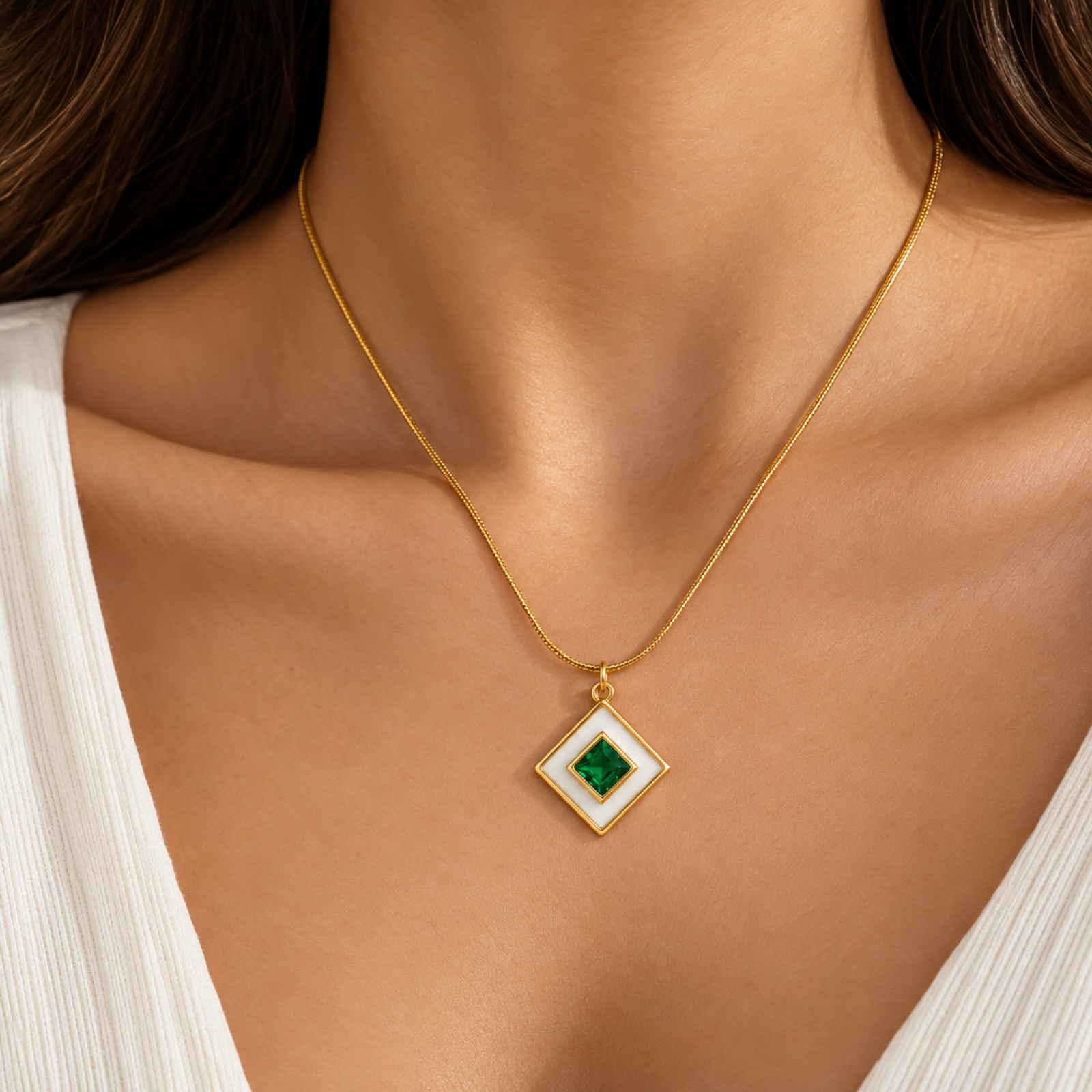 Green Pendant Necklace Design ANVOR green pendant necklace featuring a geometric diamond-shaped pendant with green centre