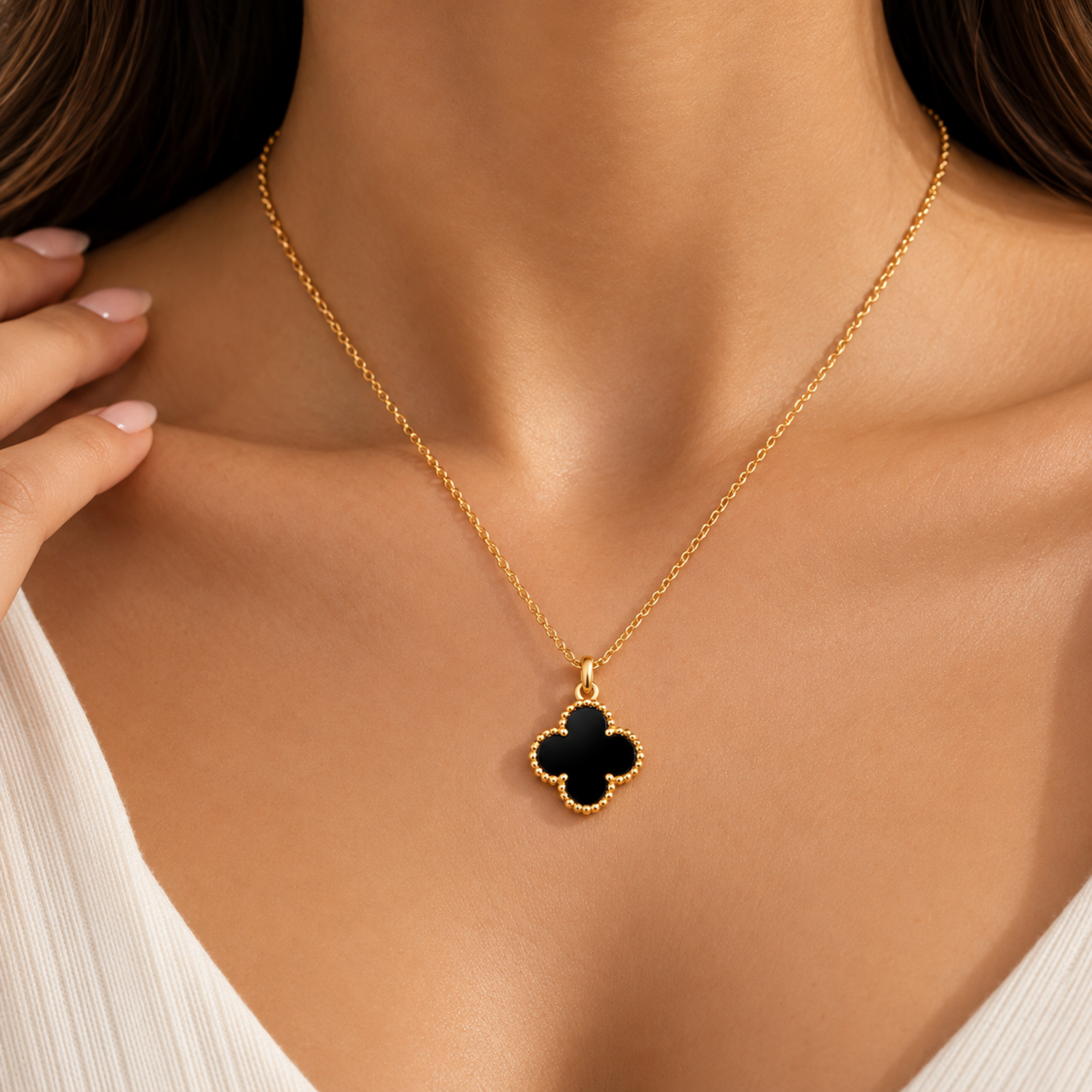 Black Clover Necklace ANVOR black clover necklace with four-lobed pendant and beaded gold-tone frame