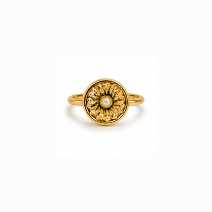 ANVOR pearl flower ring with sculptural gold-tone petals and white pearl-like centre