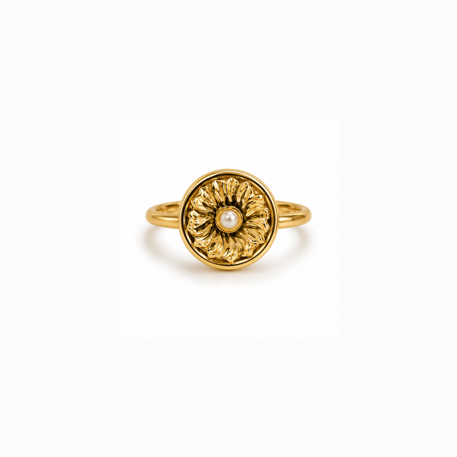 anvor-aurelia-pearl-flower-ring.webp ANVOR pearl flower ring with sculptural gold-tone petals and white pearl-like centre