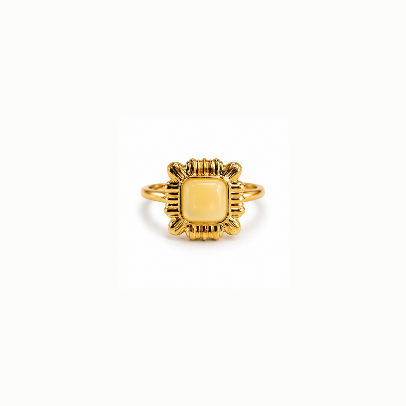 Beautiful Gold Coloured Square Statement Ring Gold-coloured square statement ring with a rounded pale yellow centre and ornate ridged decorative frame on a white background.